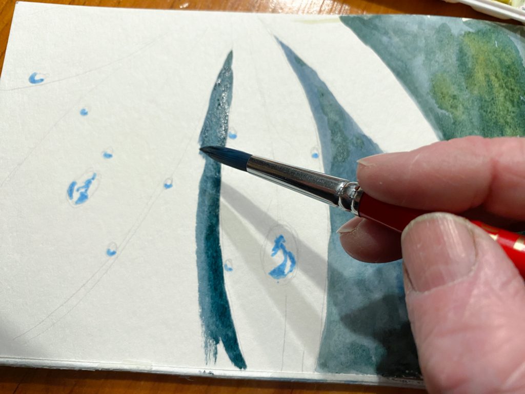 painting the background around the water drops
